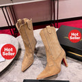 Brown Western-style cowboy boots, 8.5cm heel.