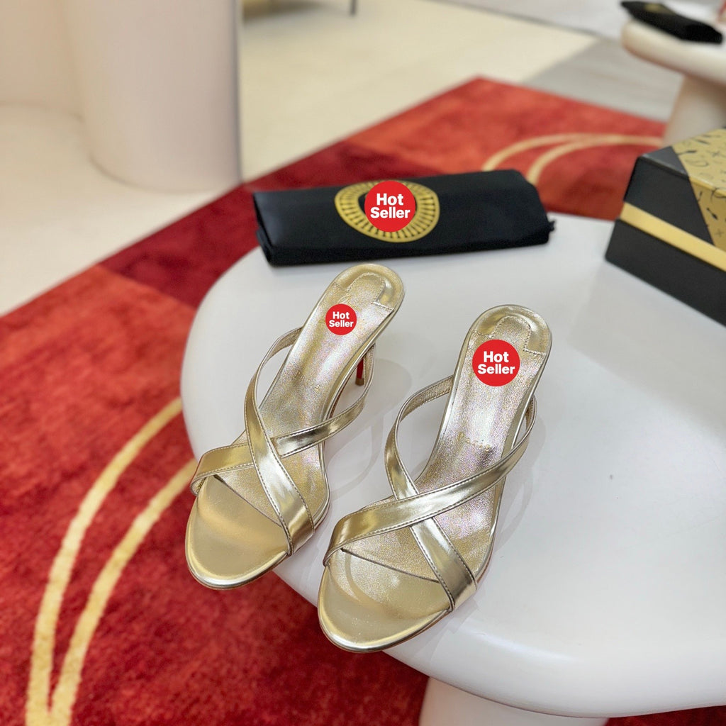 Criss-cross high-heeled mules