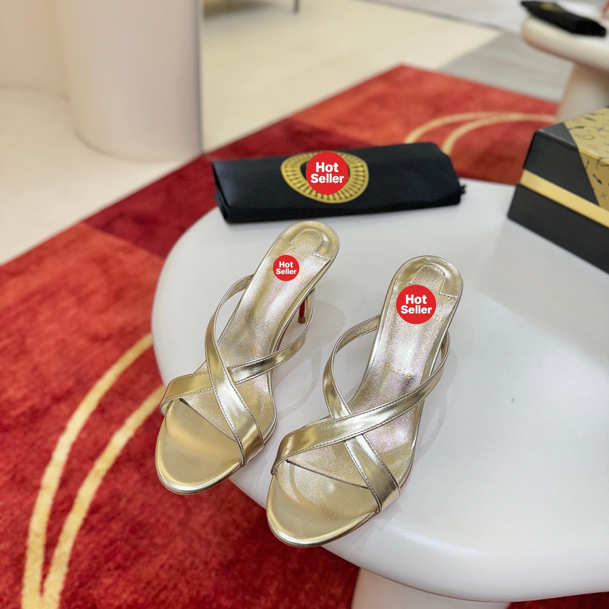 Criss-cross high-heeled mules