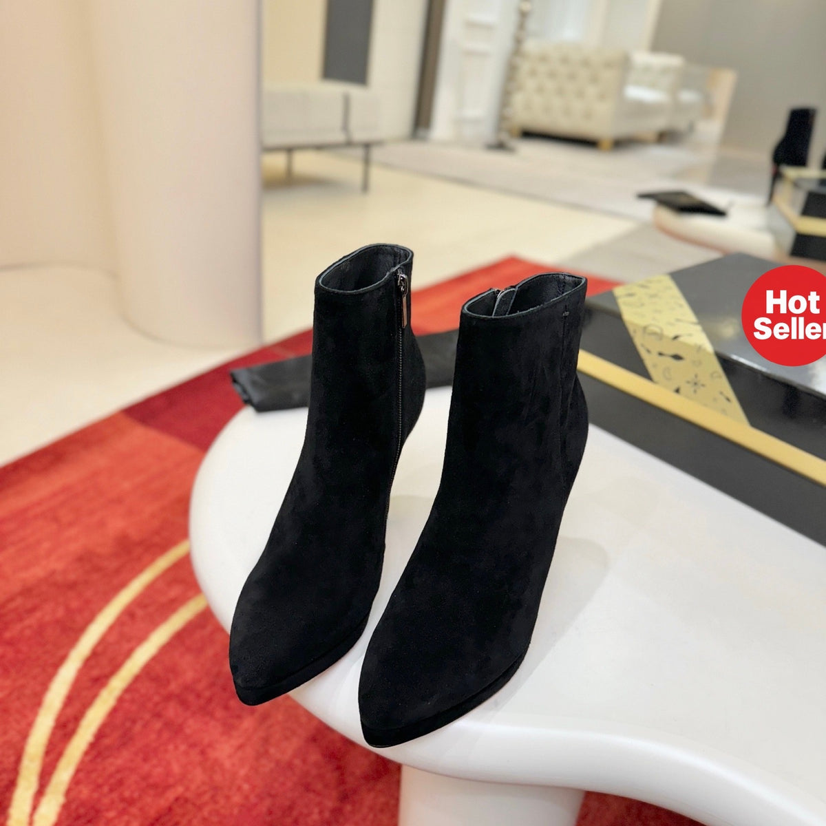 Black suede stiletto ankle boots, 12cm heel.