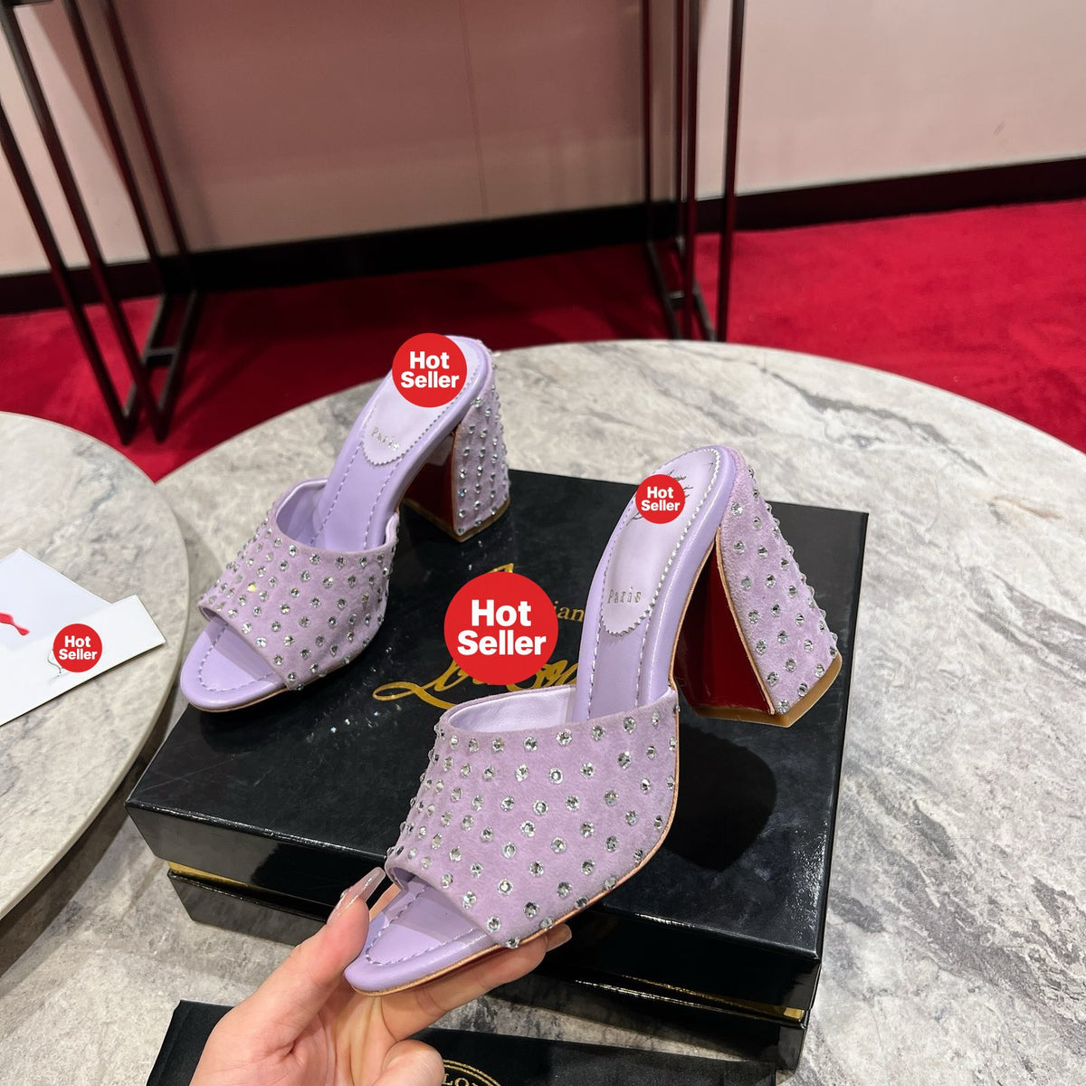 Chunky-heeled mules with purple rhinestone embellishment; heel height: 8.5cm.