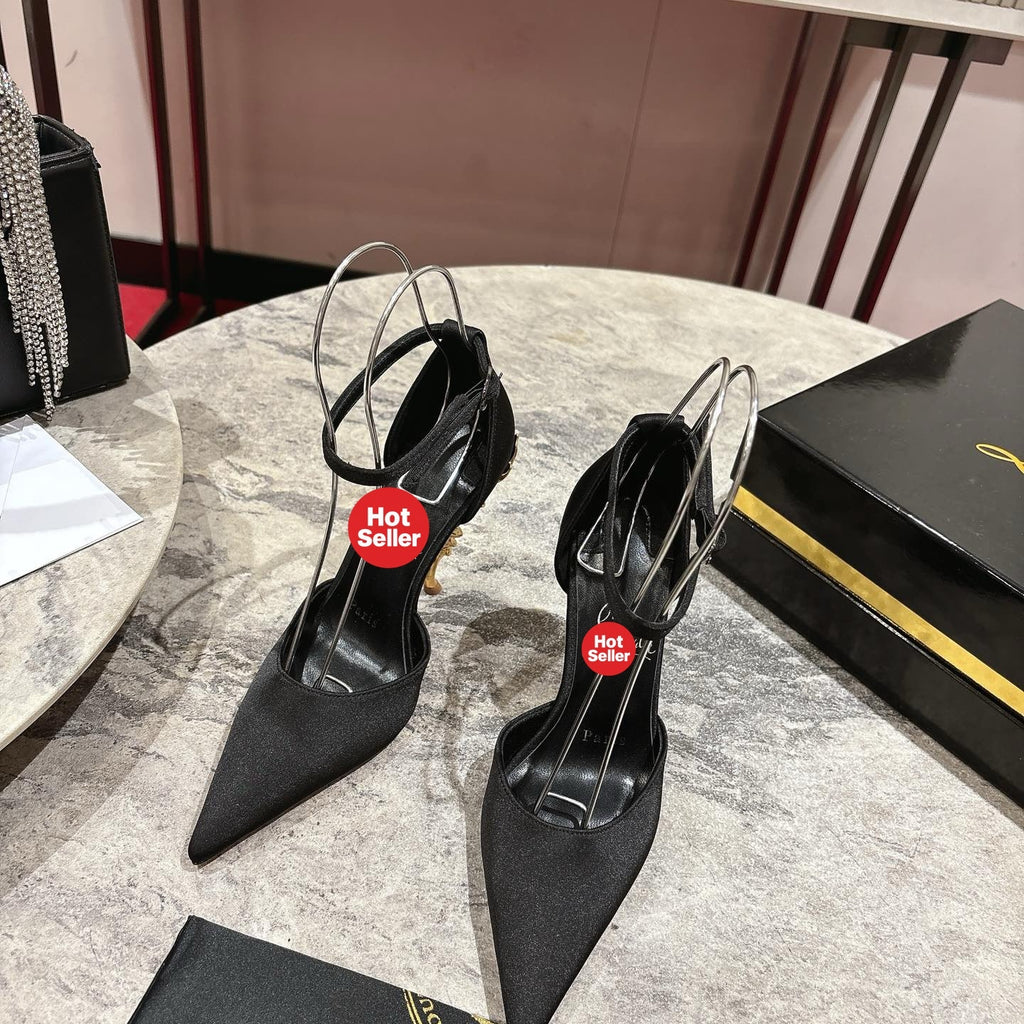 Stylish rose-adorned high heels in faux suede, with a 10cm heel.