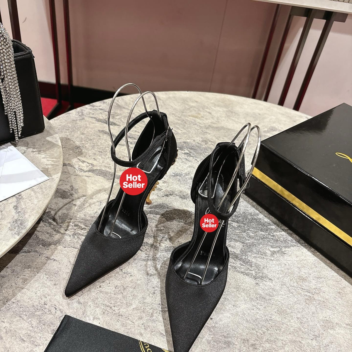 Stylish rose-adorned high heels in faux suede, with a 10cm heel.