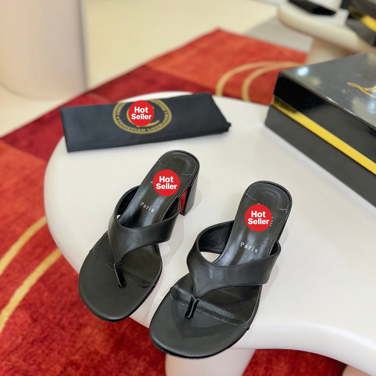 Black flip-flops, 5.5cm heel.