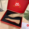 Nude patent leather flats