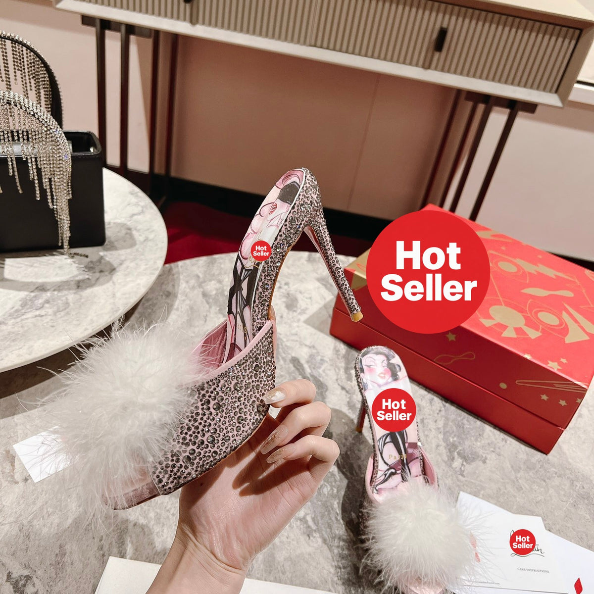 Stylish high-heeled mules with pom-poms; 10cm heel.