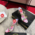 High-heeled mules with a distinctive print; 10cm heel.