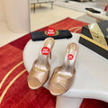 Peep-toe high-heeled mules, 10cm heel.