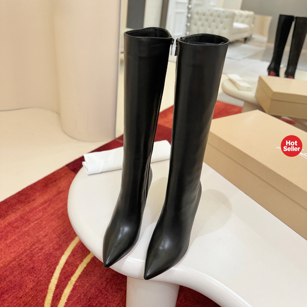 Cowhide banana-heel tall boots; 10cm heel.