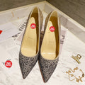 Fully rhinestone-encrusted high heels, 10cm heel.
