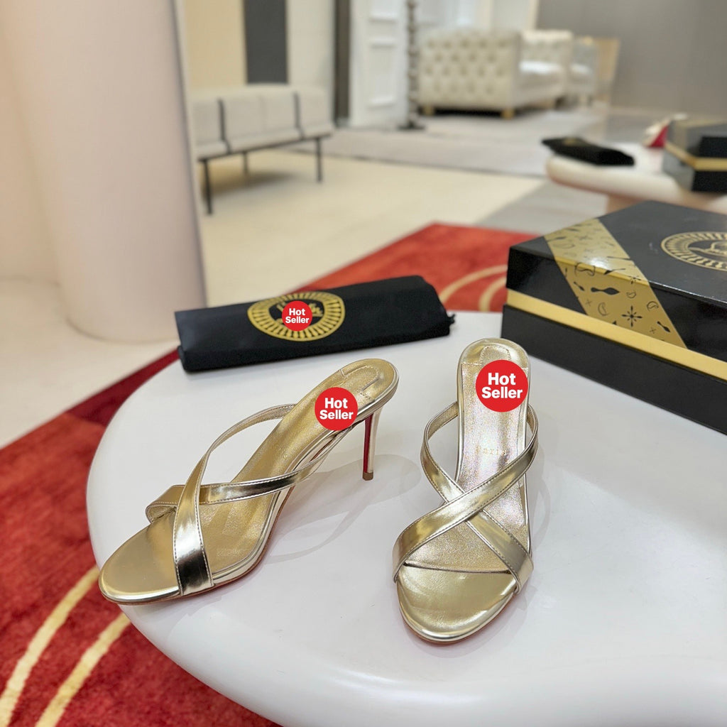 Criss-cross high-heeled mules
