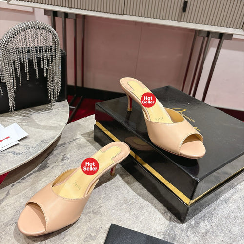 Apricot high-heeled mules, 8.5cm heel.