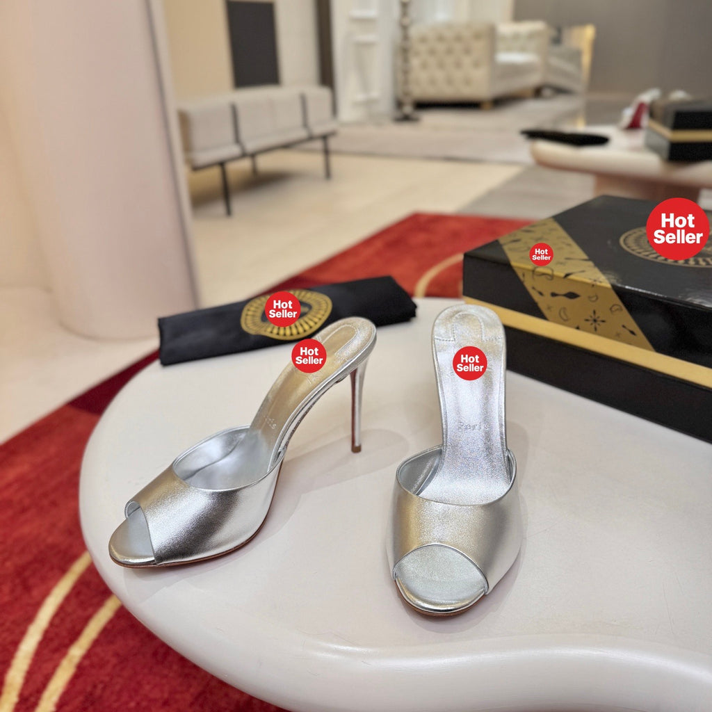 Silver peep-toe high-heeled mules, 10cm heel.
