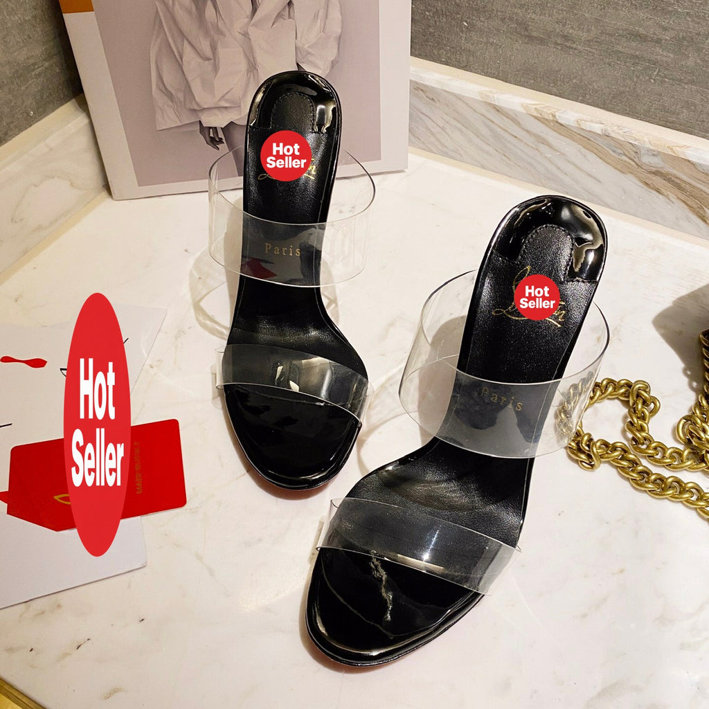 Black high-heeled mules with transparent detailing; 10cm heel.