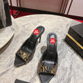 High-heeled mules with stylish leopard-print patches; 10cm heel.