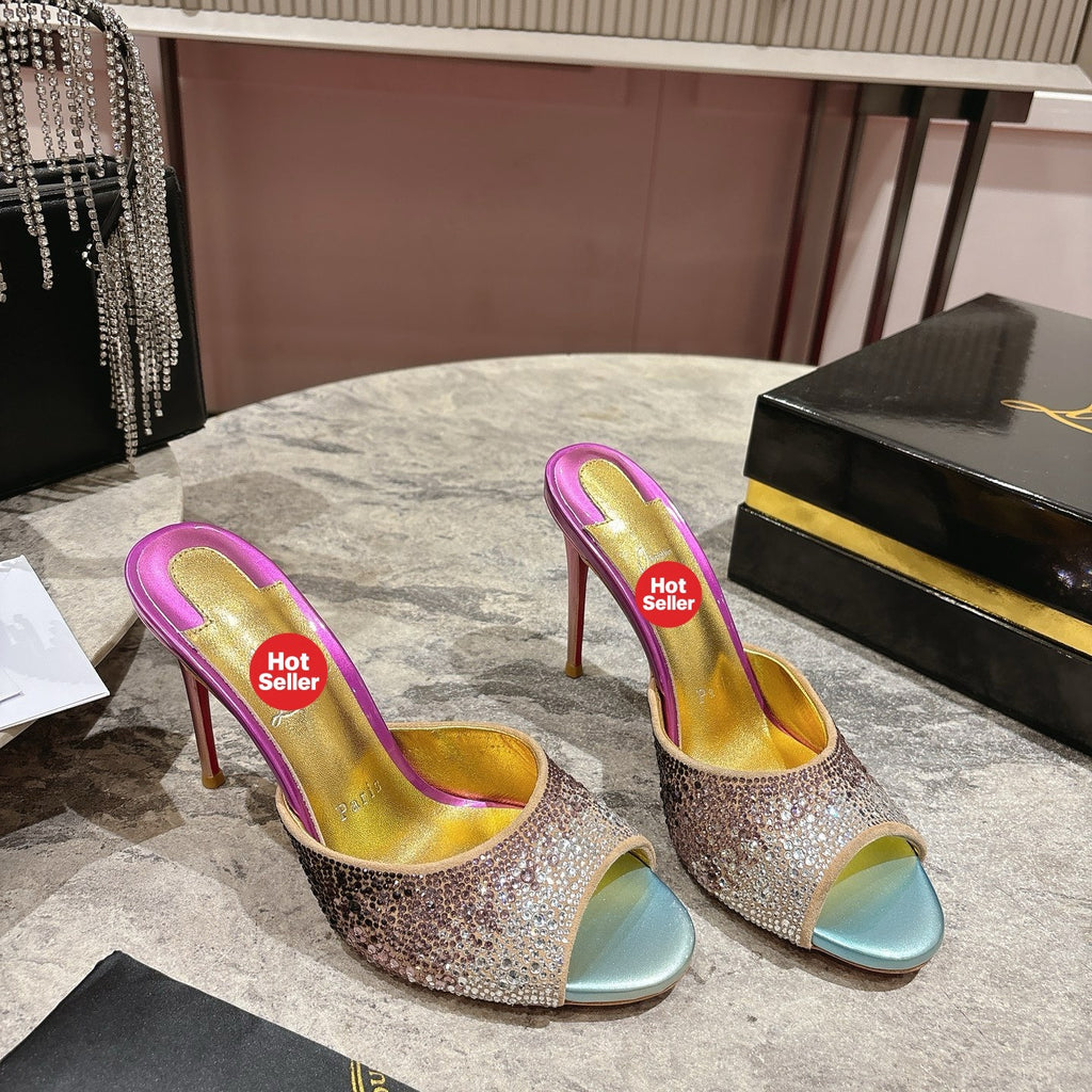 Peep-toe high-heeled slides with colorful rhinestones; 10cm heel.