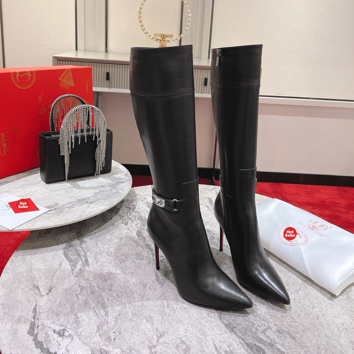 Black calfskin high-shaft boots, 10cm heel.