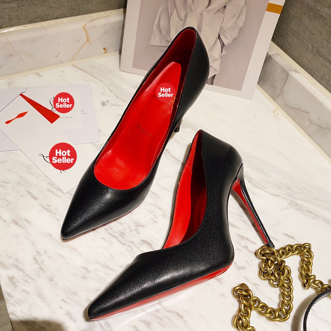 Black leather high heels, 12cm heel.