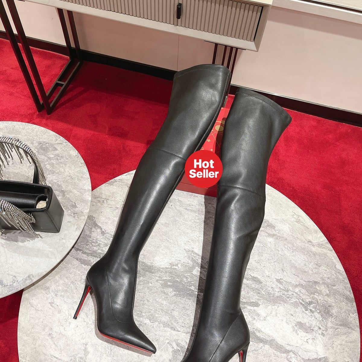 Sophisticated long boots, 10cm heel.