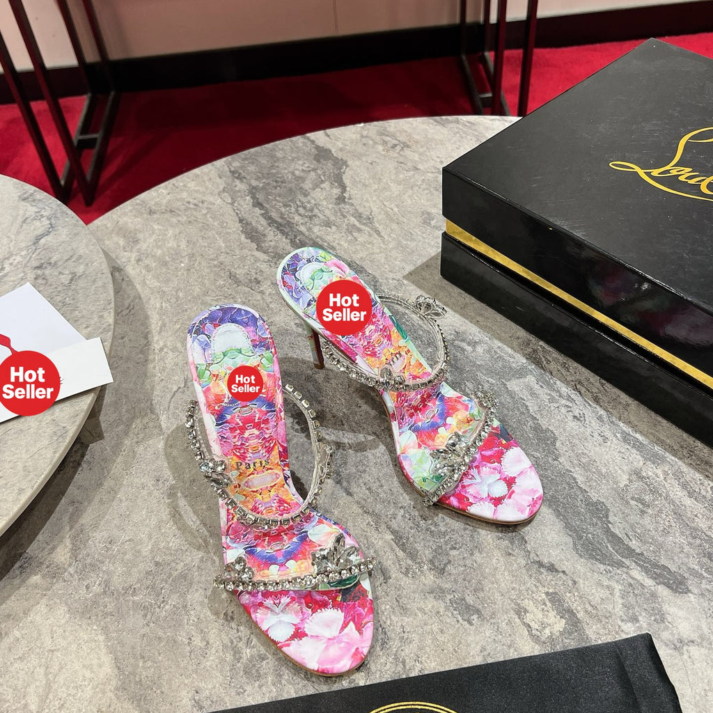 High-heeled mules with a distinctive print; 10cm heel.
