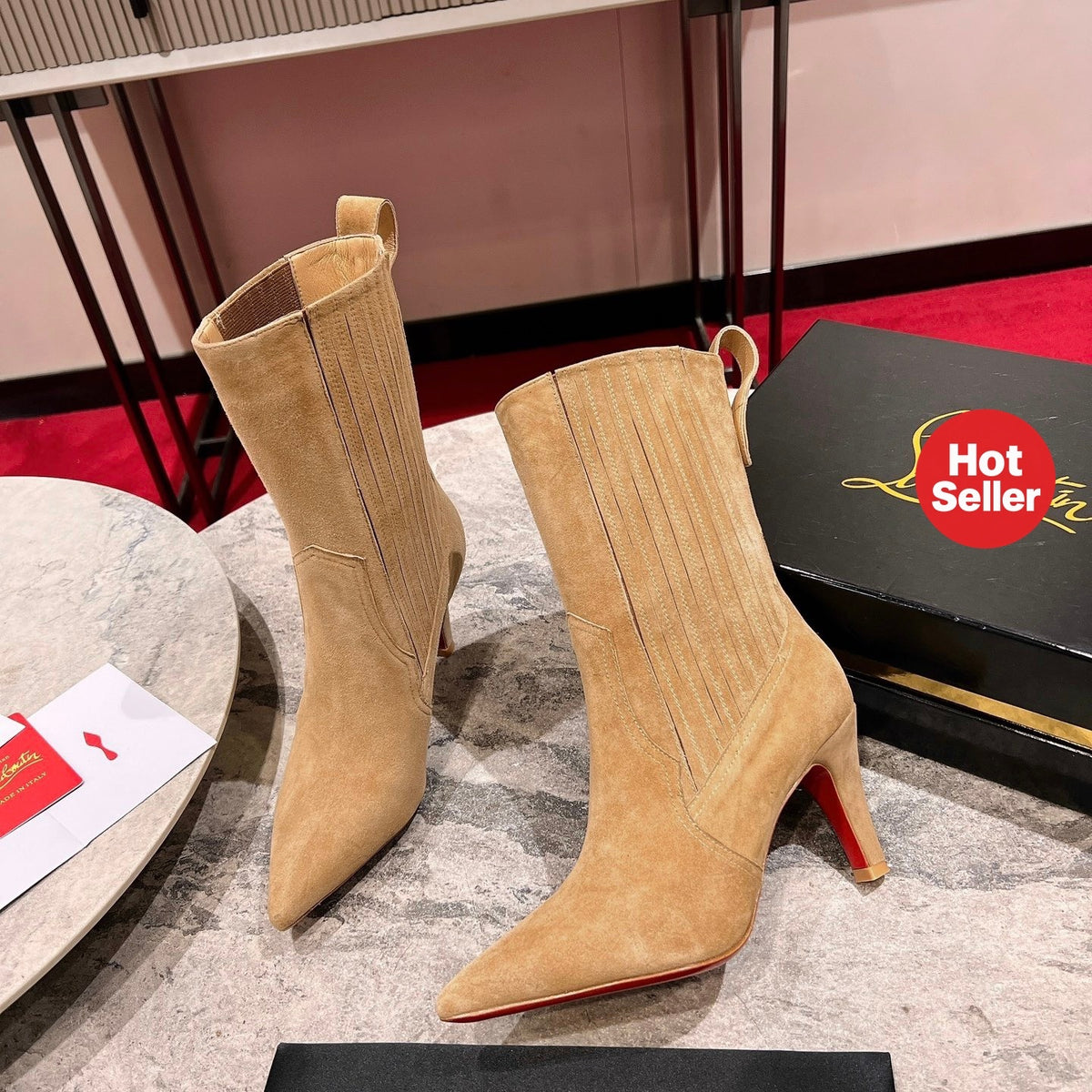 This full-series tall boot features 3D upper embroidery and handcrafted stitching, creating a dimensional look; heel height: 8.5cm.