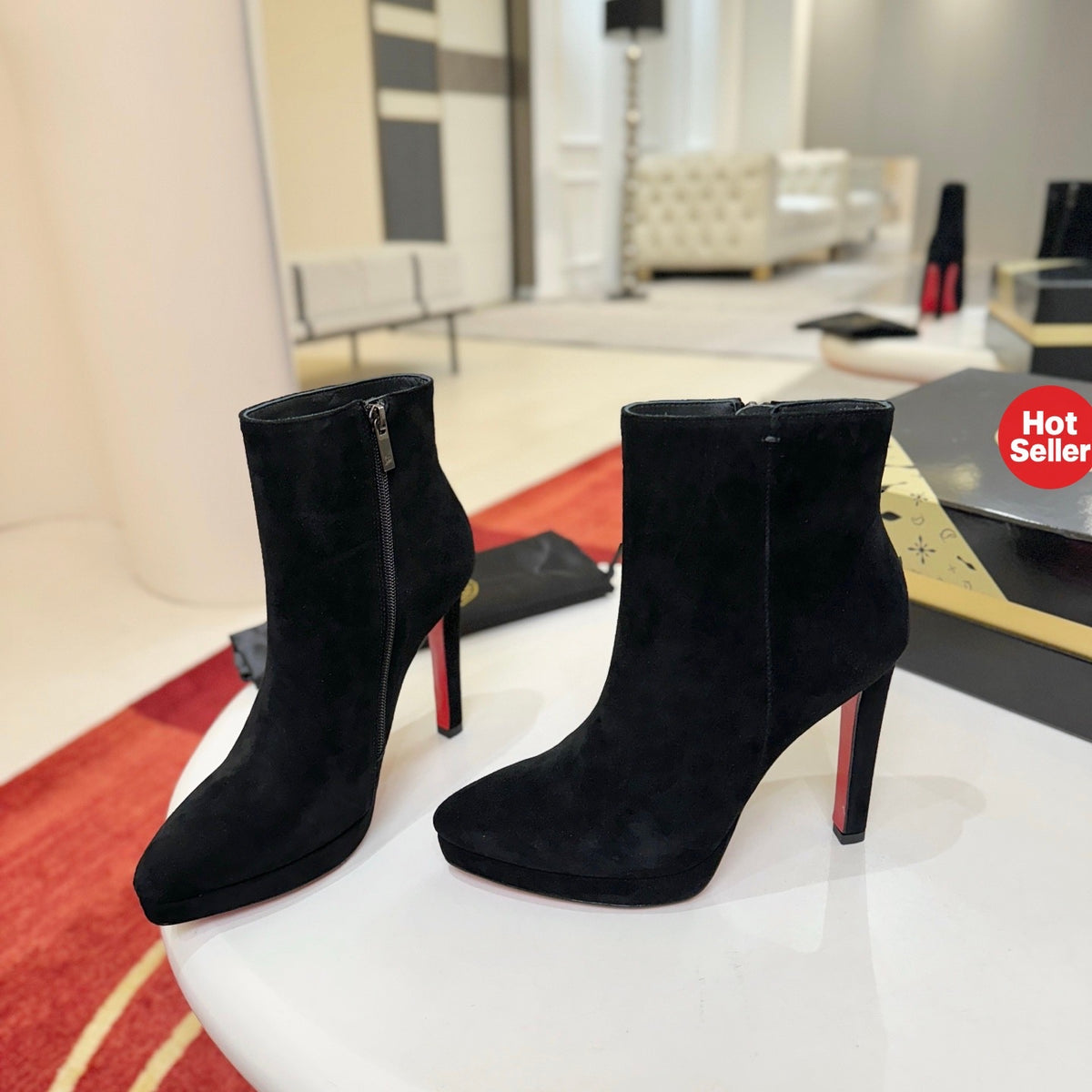 Black suede stiletto ankle boots, 12cm heel.