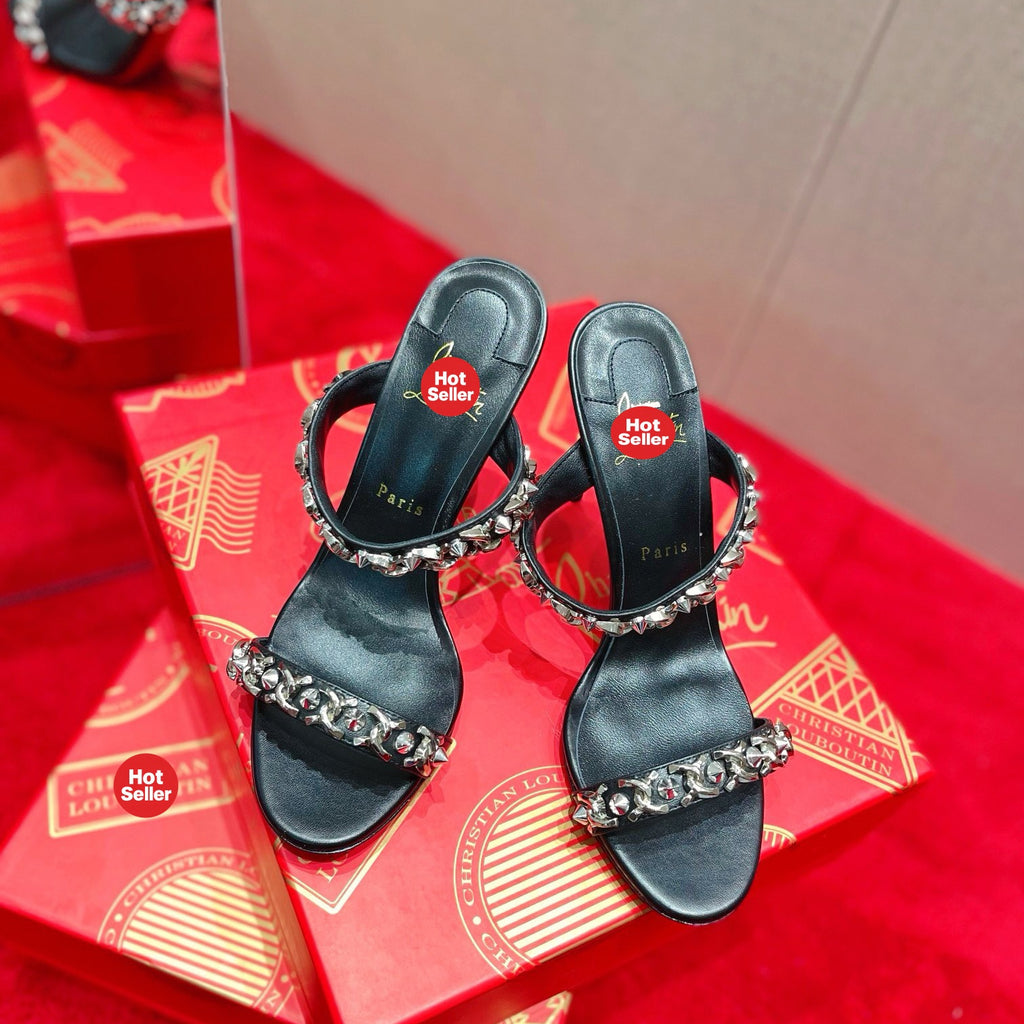 Chain-detail high-heeled mules, 10cm heel.
