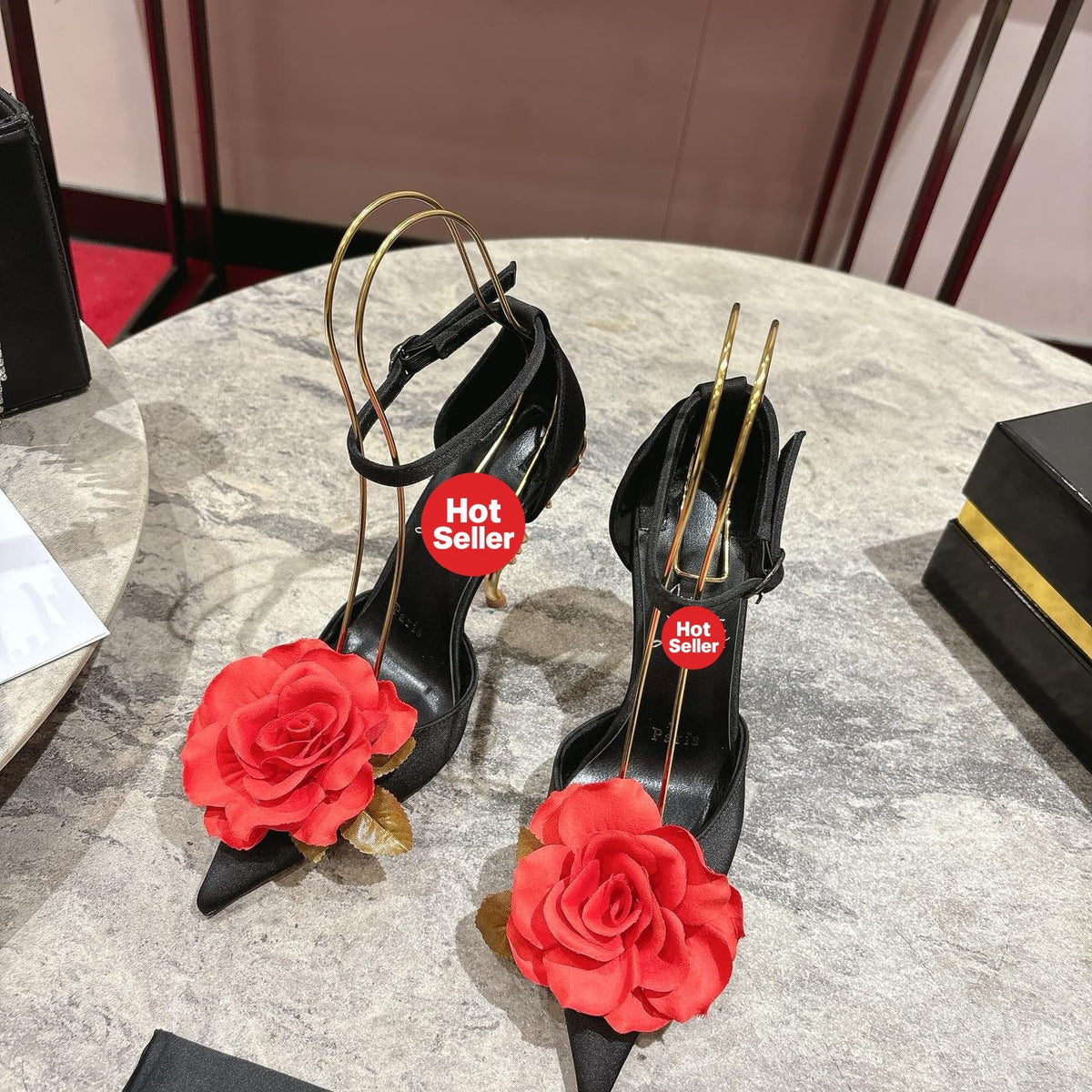 High-heeled shoes featuring a rose design; 10cm heel.
