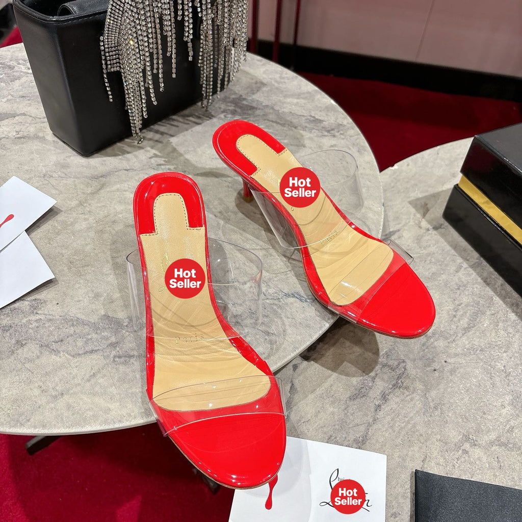 Red translucent high-heeled mules, 8.5cm heel.
