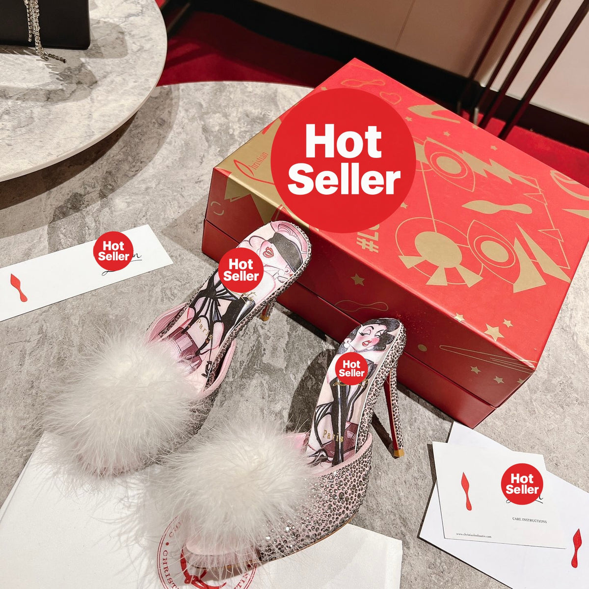 Stylish high-heeled mules with pom-poms; 10cm heel.
