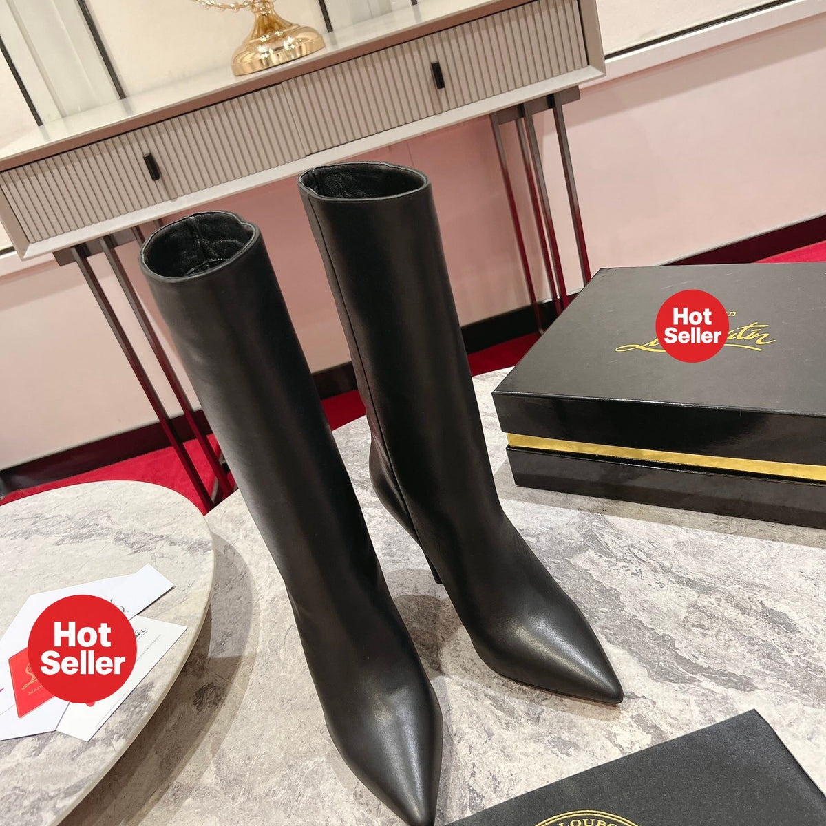 Black leather mid-calf boots, 10cm heel.
