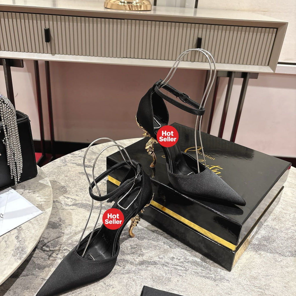 Stylish rose-adorned high heels in faux suede, with a 10cm heel.