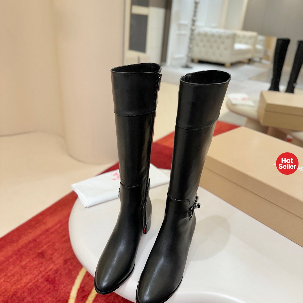 Distinctive premium black leather tall boots; 6.5cm heel.