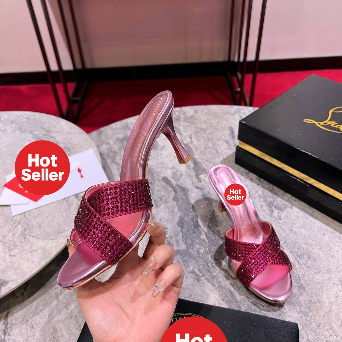 Peep-toe high-heeled slides with diamond embellishment; 8.5cm heel.