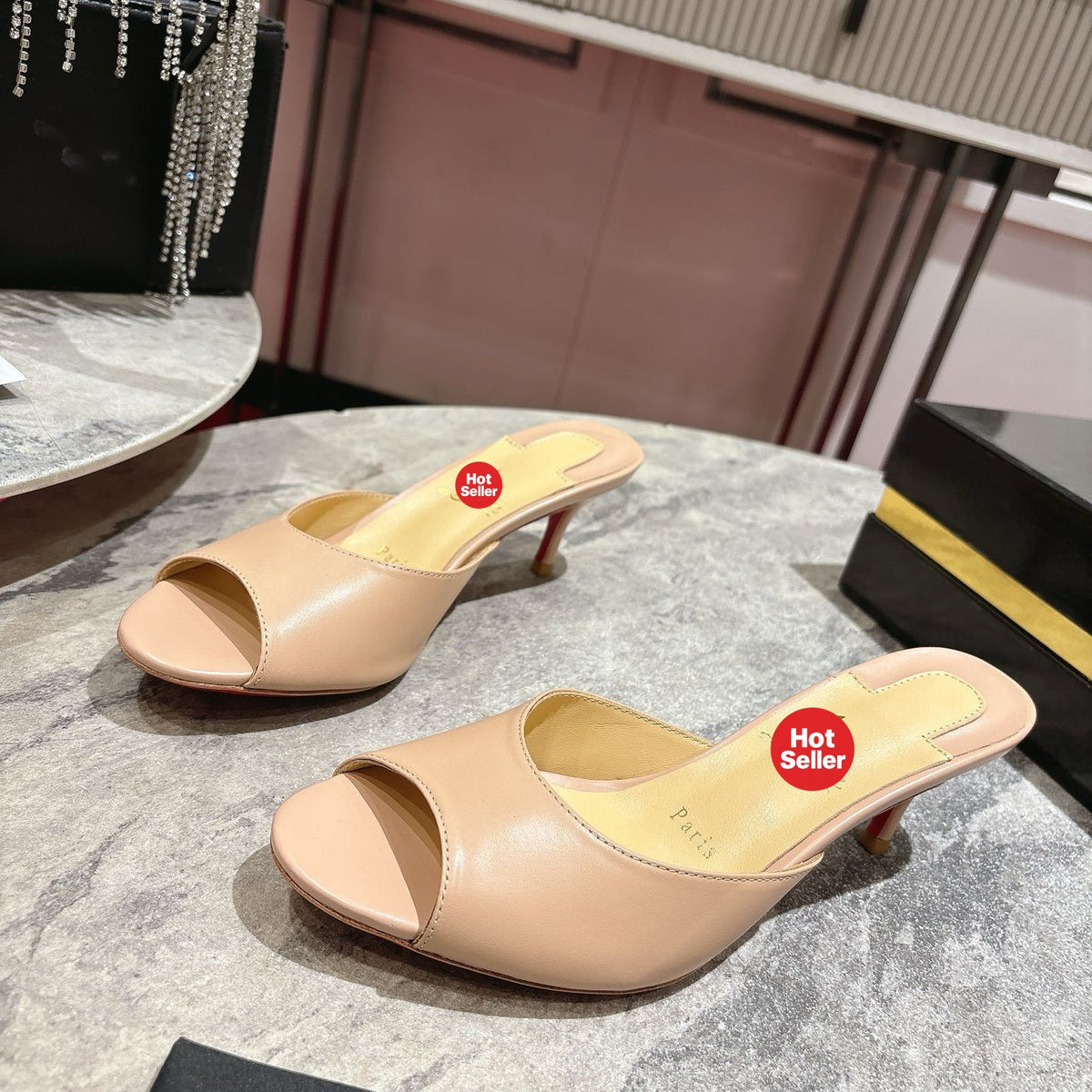 Apricot high-heeled mules, 8.5cm heel.