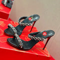 Chain-detail high-heeled mules, 10cm heel.