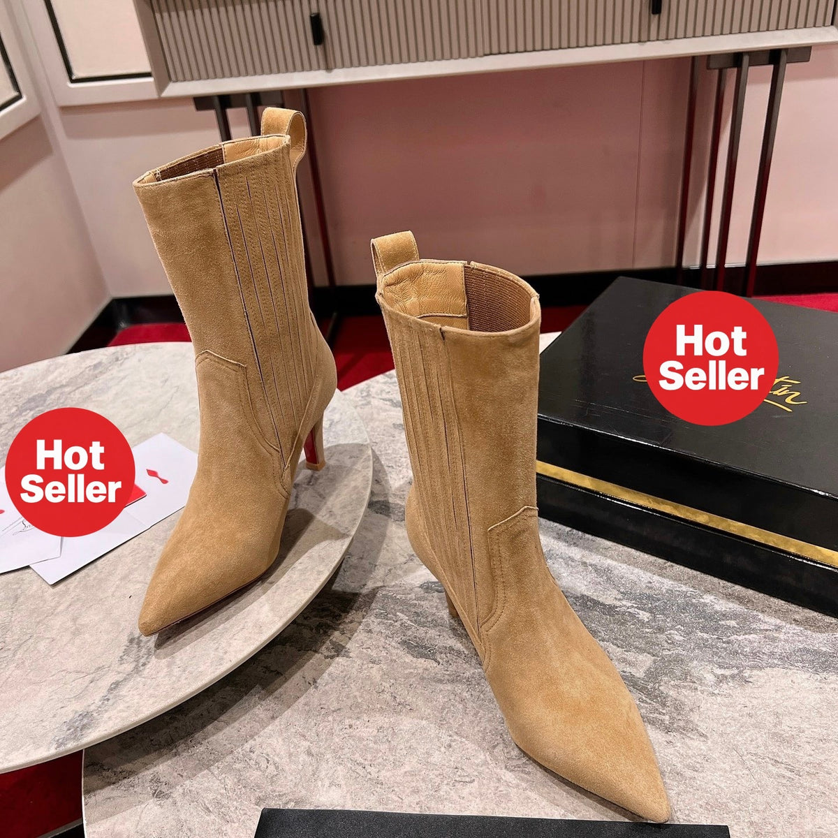 This full-series tall boot features 3D upper embroidery and handcrafted stitching, creating a dimensional look; heel height: 8.5cm.