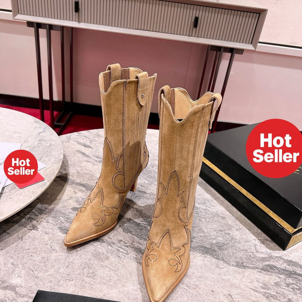 Brown Western-style cowboy boots, 8.5cm heel.