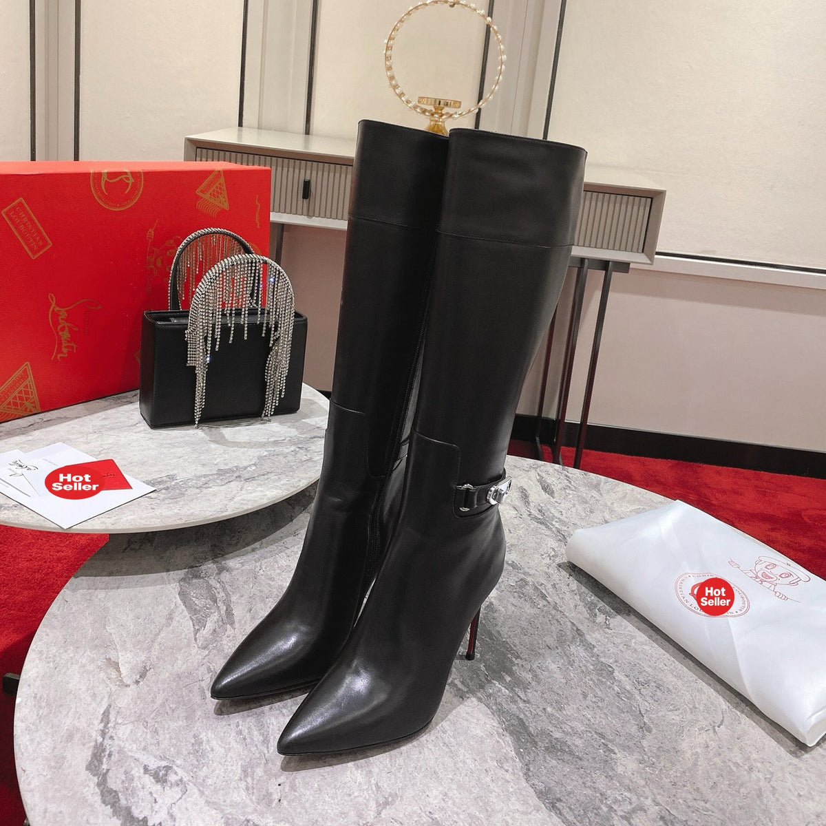 Black calfskin high-shaft boots, 10cm heel.