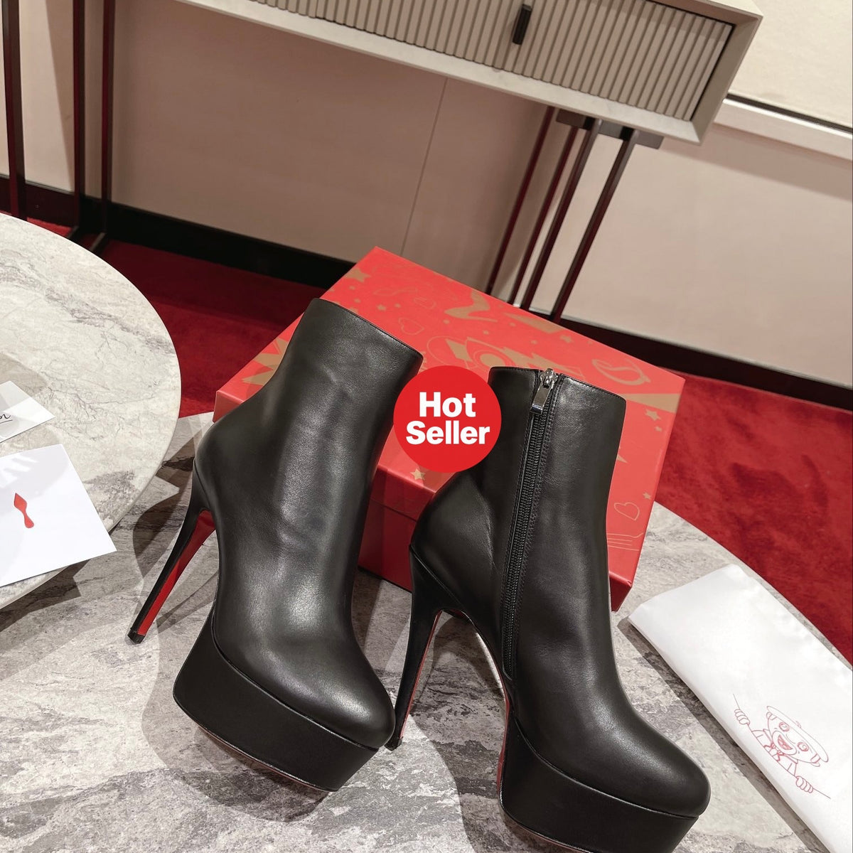 Black Nappa leather ankle boots featuring a soaring 12cm height. Heel: 13cm.