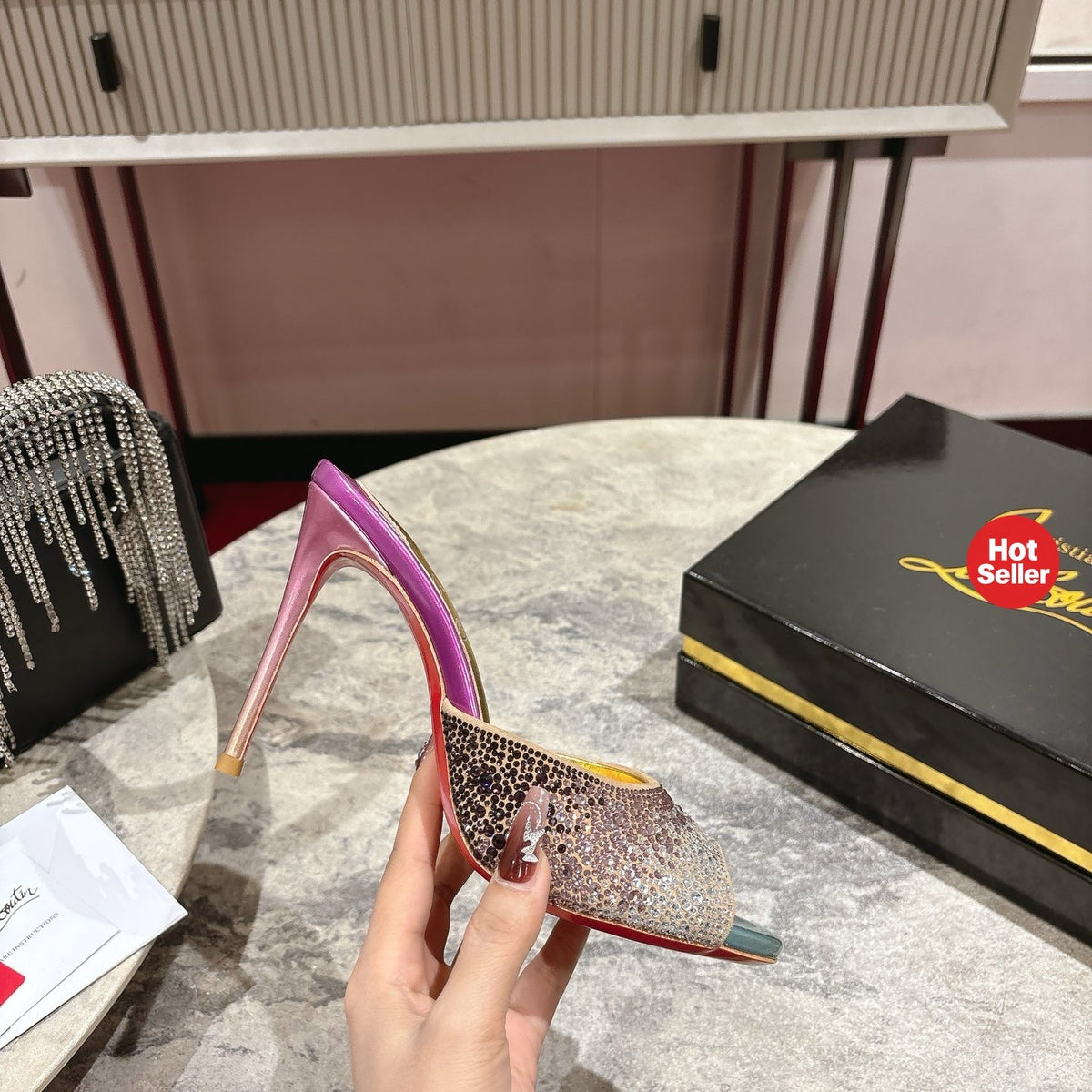 Peep-toe high-heeled slides with colorful rhinestones; 10cm heel.