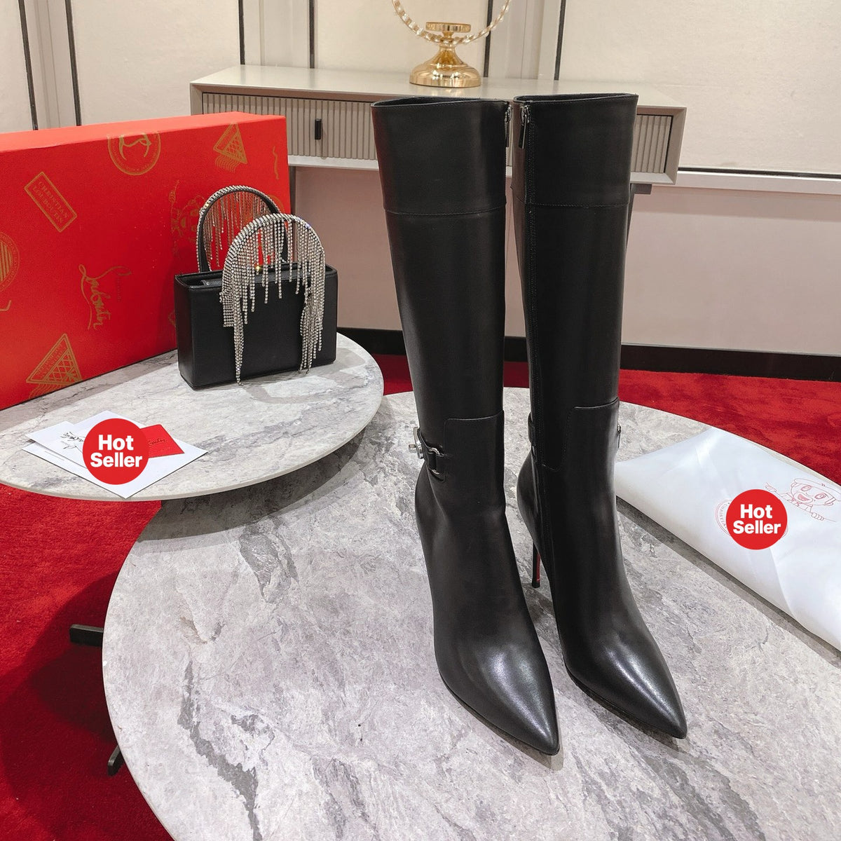 Black calfskin high-shaft boots, 10cm heel.