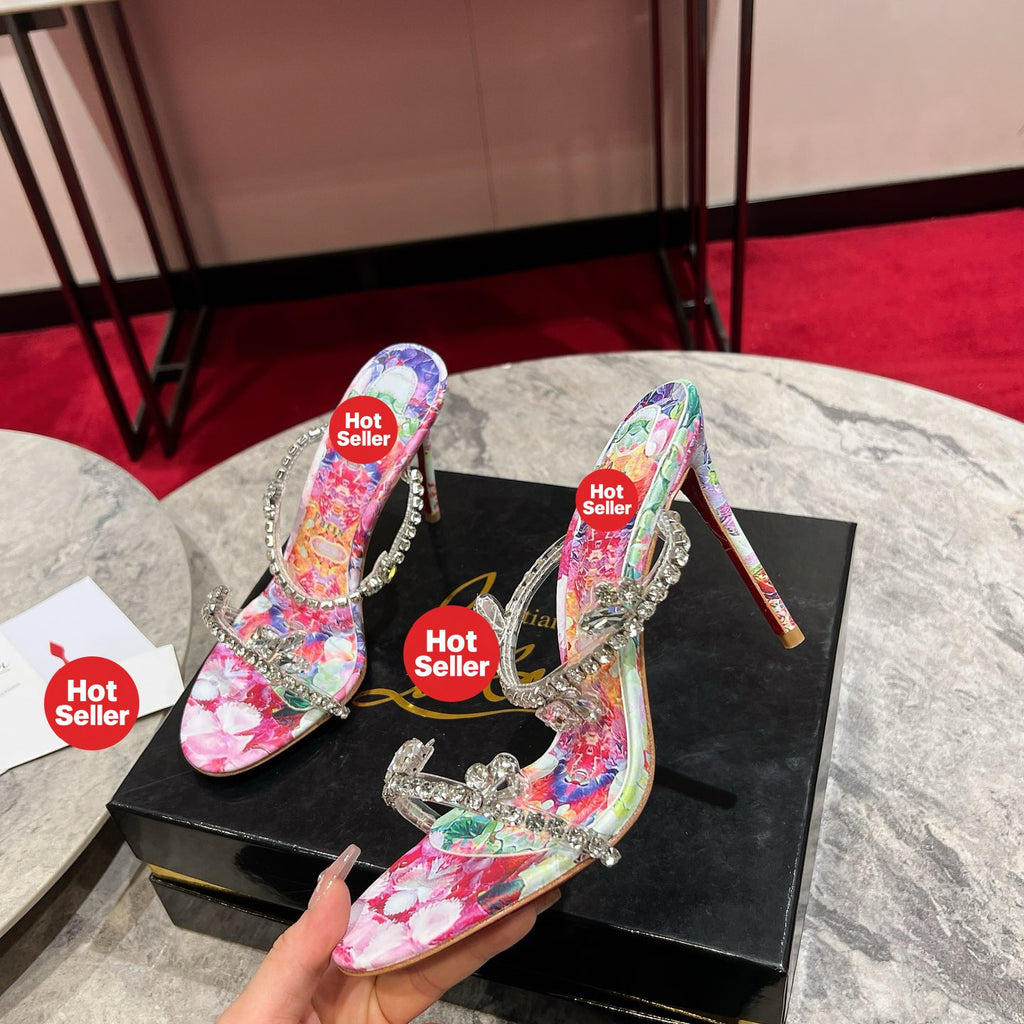 High-heeled mules with a distinctive print; 10cm heel.