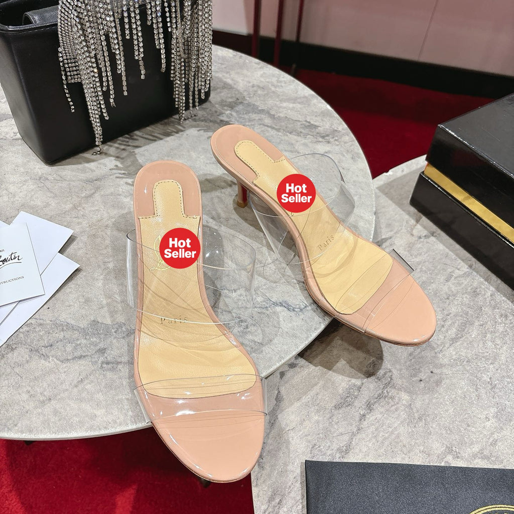 Clear high-heeled mules, 8.5cm heel.