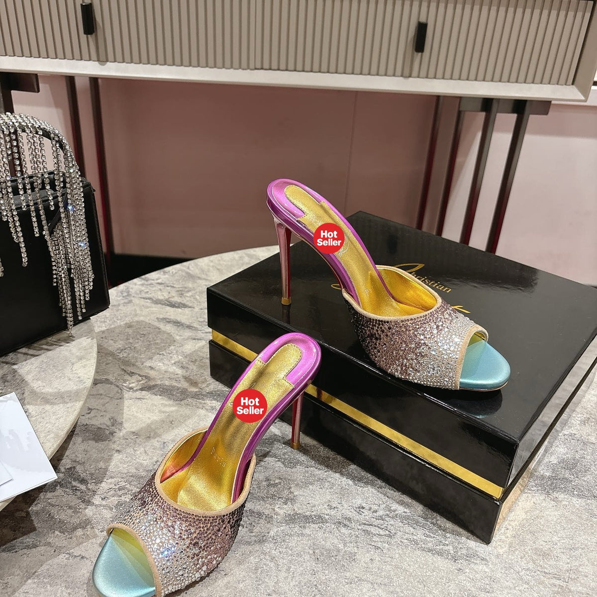 Peep-toe high-heeled slides with colorful rhinestones; 10cm heel.