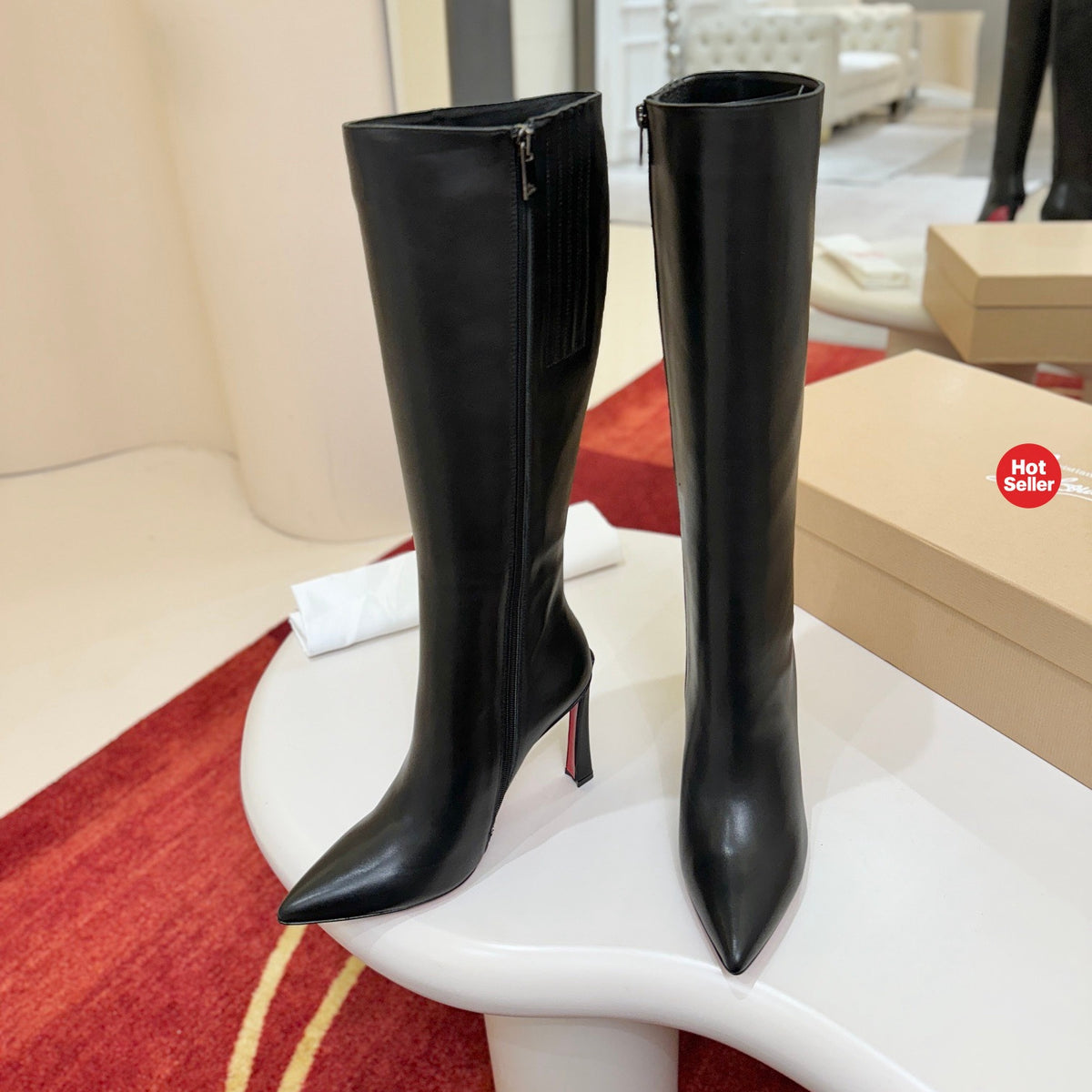 Cowhide banana-heel tall boots; 10cm heel.