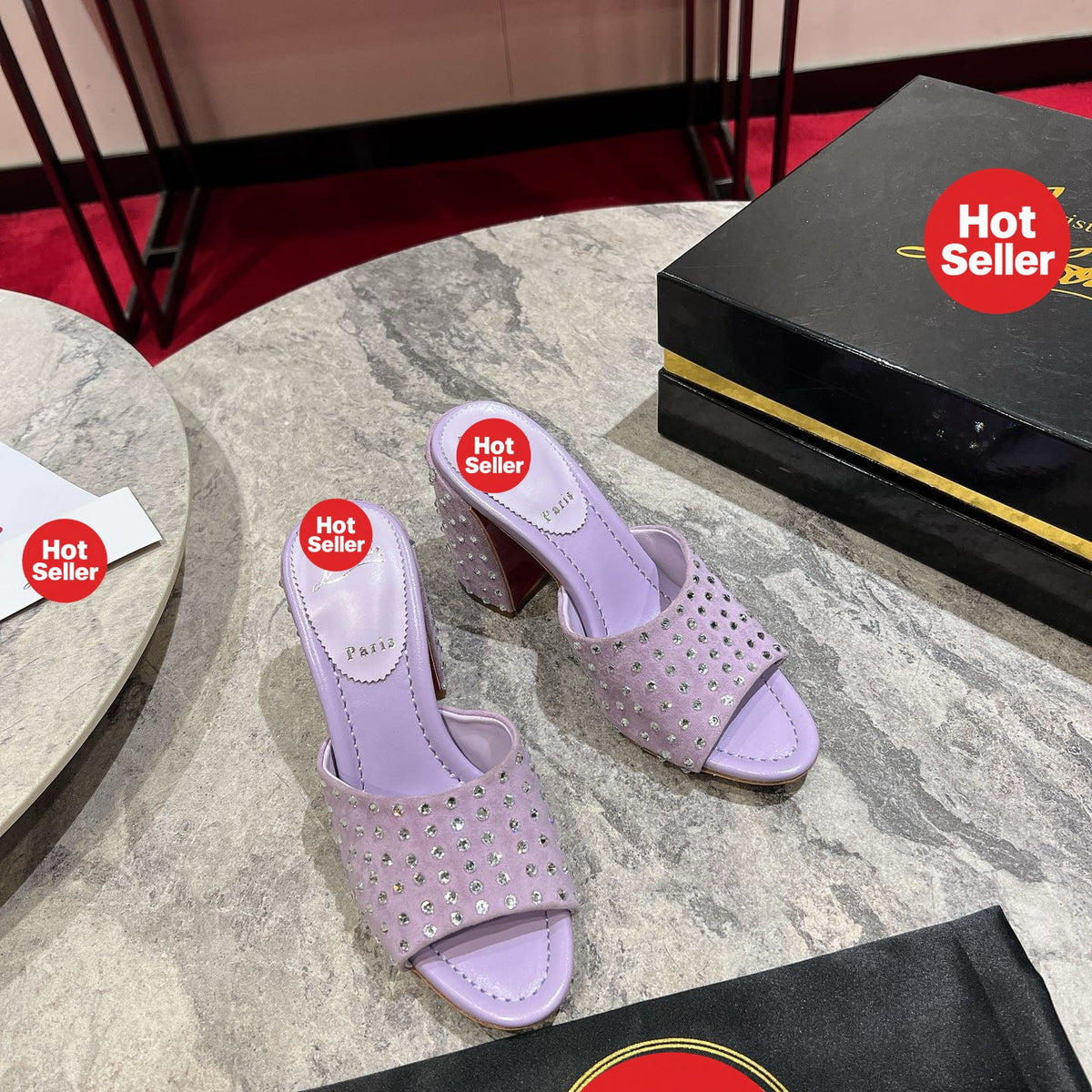 Chunky-heeled mules with purple rhinestone embellishment; heel height: 8.5cm.