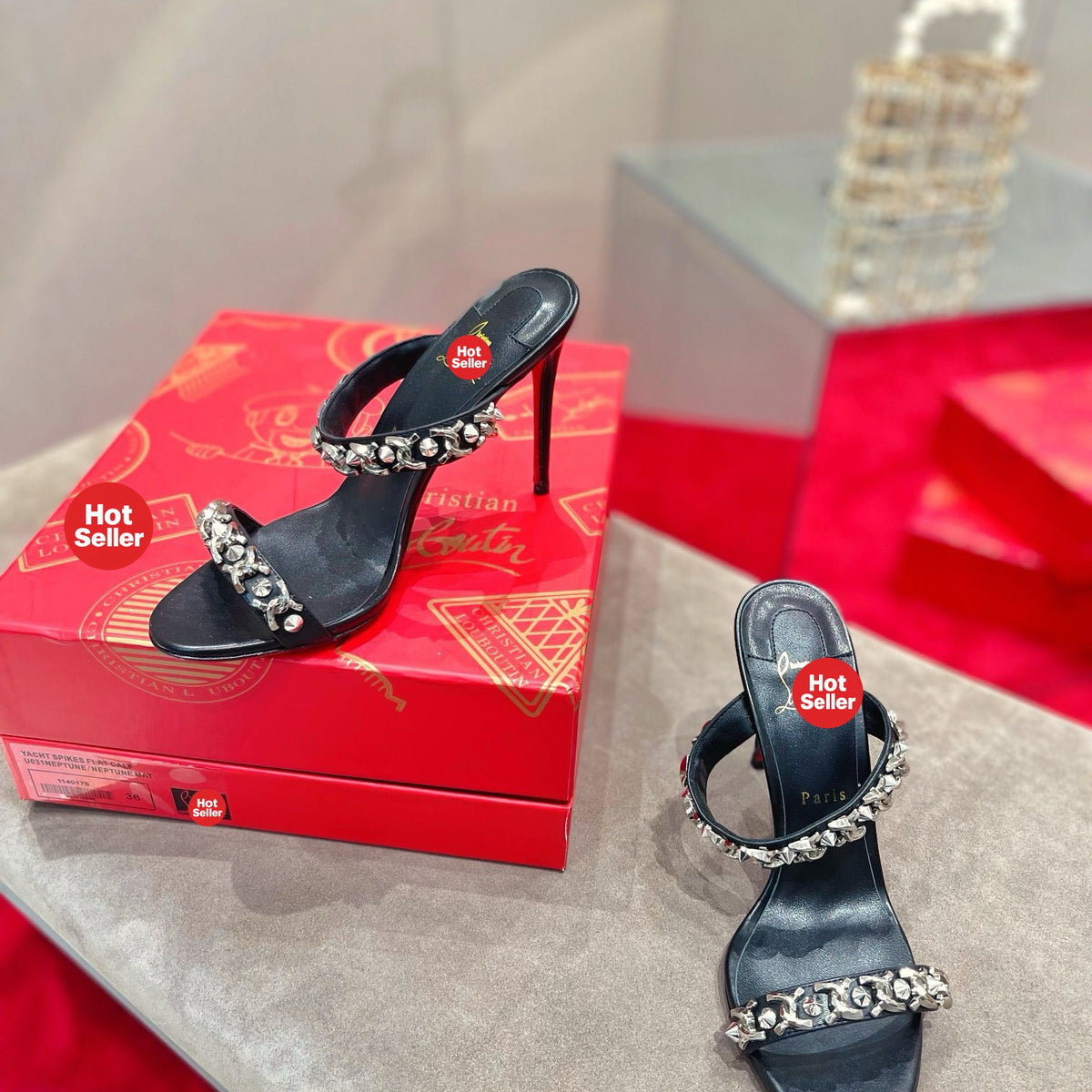 Chain-detail high-heeled mules, 10cm heel.