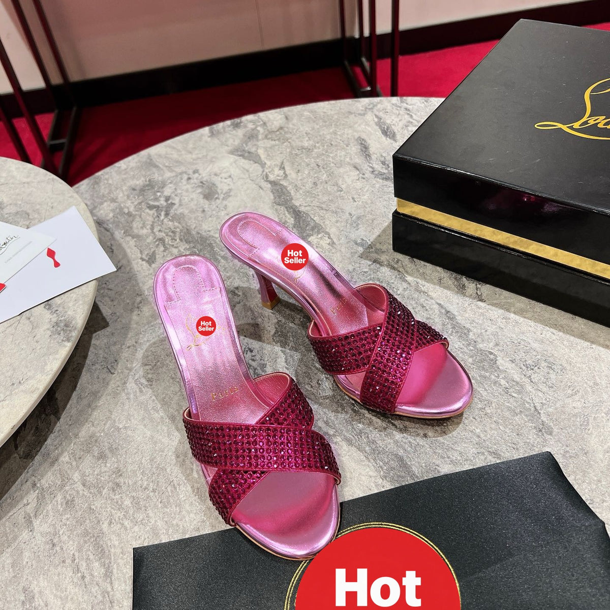 Peep-toe high-heeled slides with diamond embellishment; 8.5cm heel.