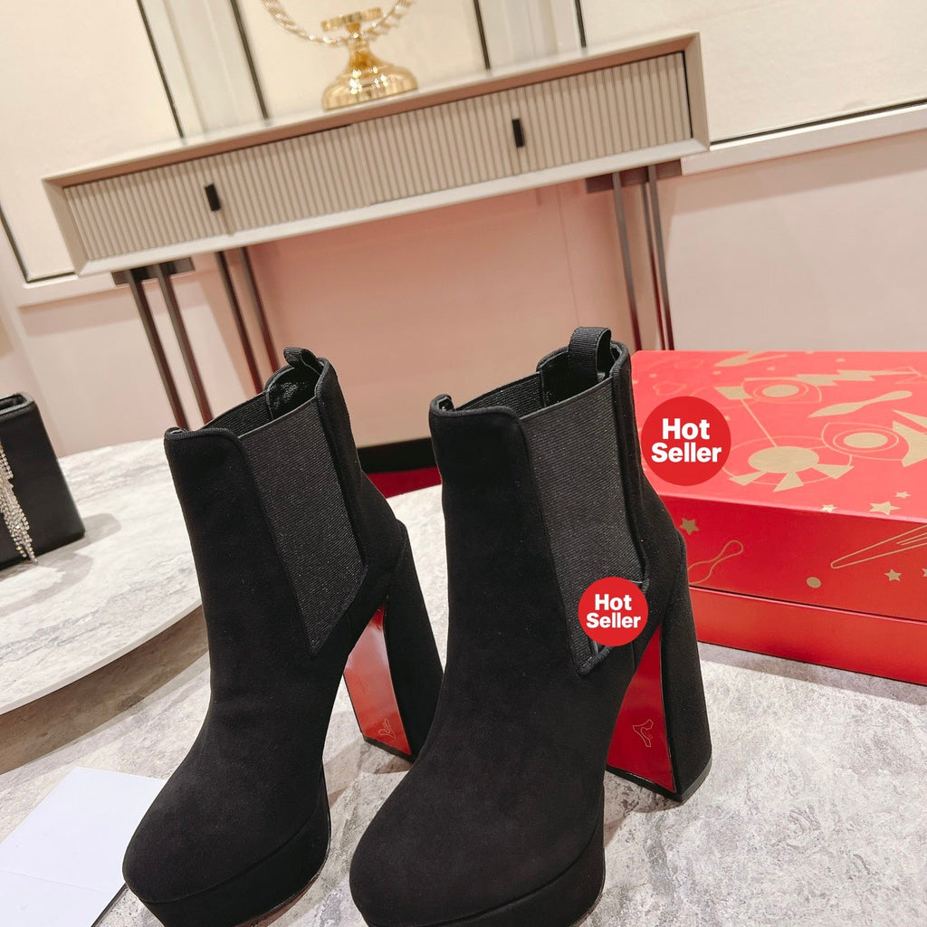 Black suede ankle boots, 13cm heel.